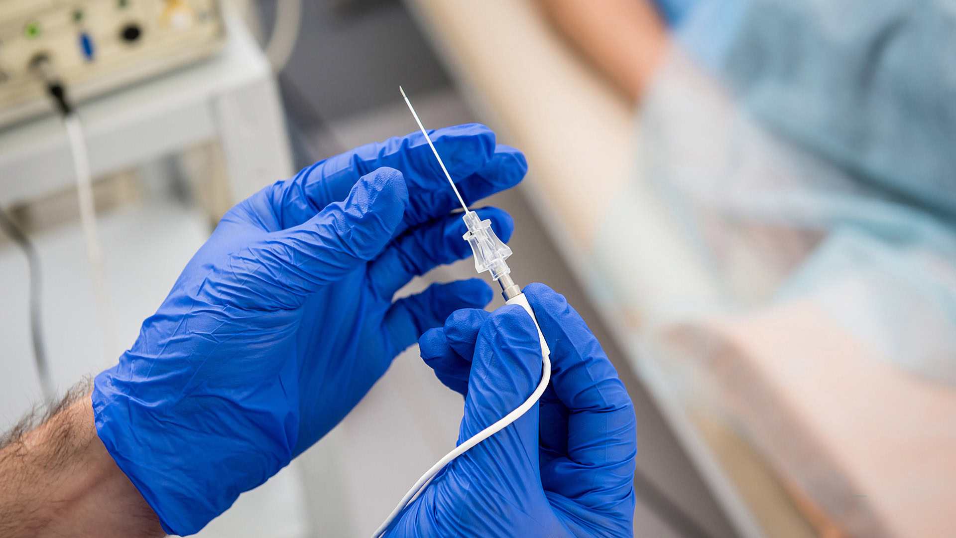 Doctor using catheter for radiofrequency ablation procedure